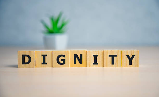 istock DIGNITY word made with building blocks. business concept. 1199543825