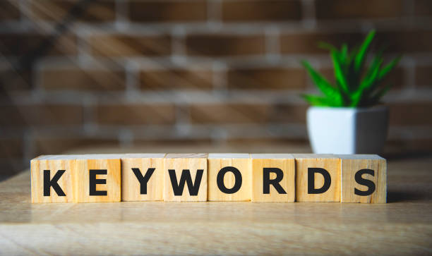 KEYWORDS word concept on wodden blocks. internet concept. KEYWORDS word concept on wodden blocks. internet concept dictionary stock pictures, royalty-free photos & images
