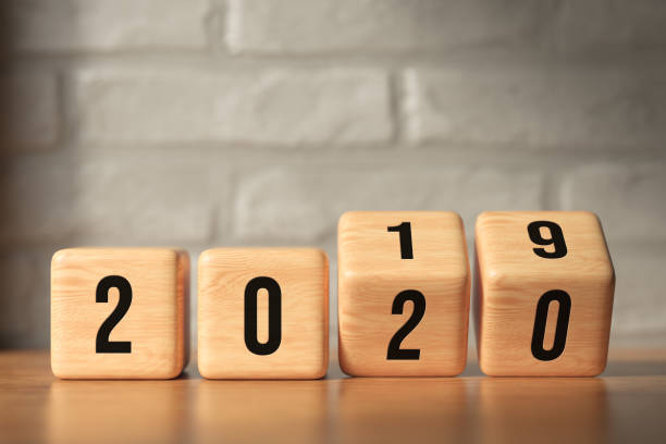 istock cubes turning from year 2019 to 2020 - 3D rendered illustration 1199544747