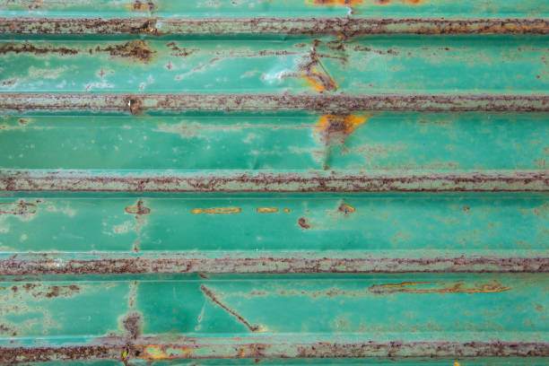 istock Pattern of Rust on the Green Wall metal sheet texture background 1199545573