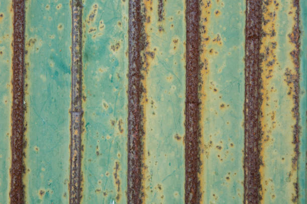 Pattern of Rust on the Green Wall metal sheet texture background