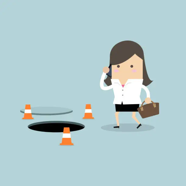 Vector illustration of Businesswoman is talking on the phone without being careful of the hole on the ground.