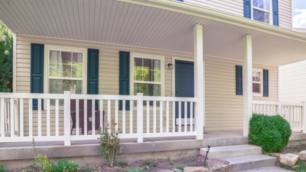 istock Panorama frame white double storey house with large porch 1199550187