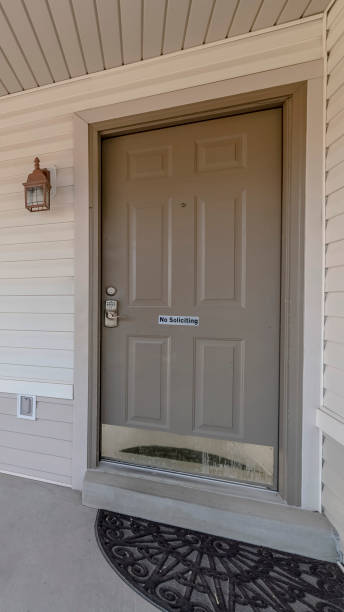 istock Vertical Covered front porch with grey and white decor 1199551242