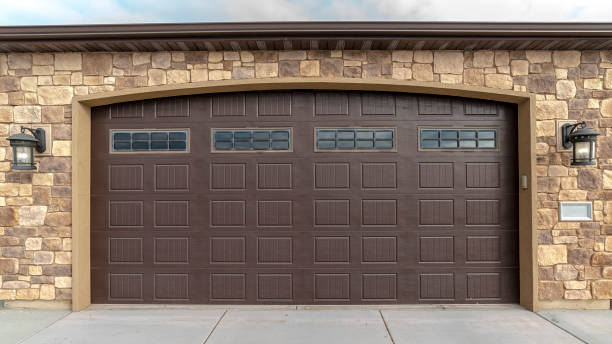 istock Panorama frame Large garage with double brown wooden door 1199551977