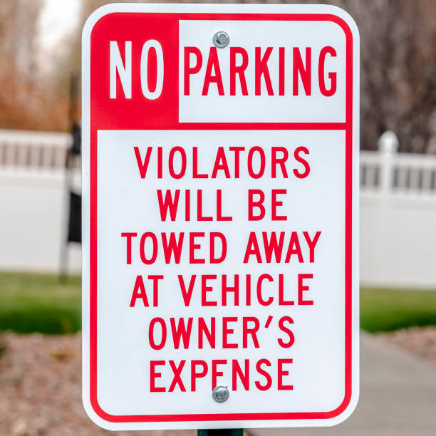 istock Square No Parking sign with Tow Away warning 1199552920