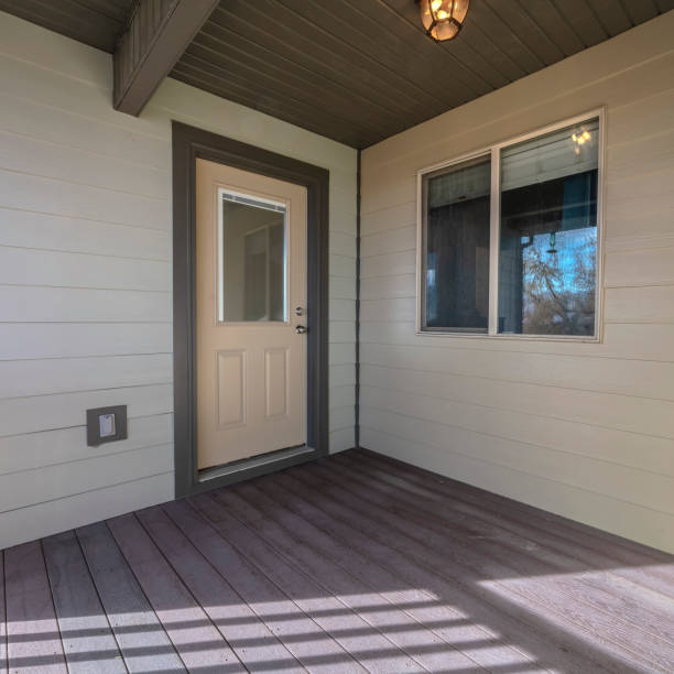 istock Square Wooden deck in front of a front door to a home 1199552964
