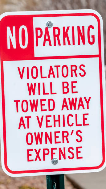 istock Vertical No Parking sign with Tow Away warning 1199554277
