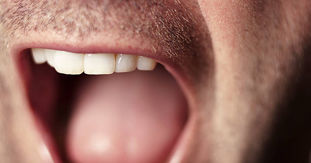 istock male mouth close up 119955501