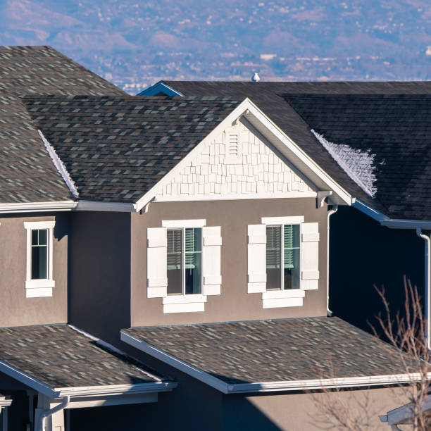istock Square Beautiful grey houses against mountain background day light 1199555088