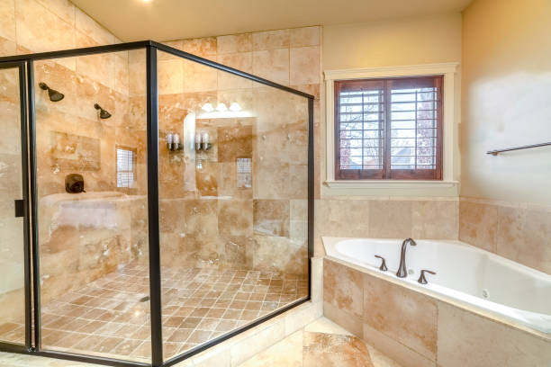 istock Modern luxury bathroom with glass shower cubicle 1199556264