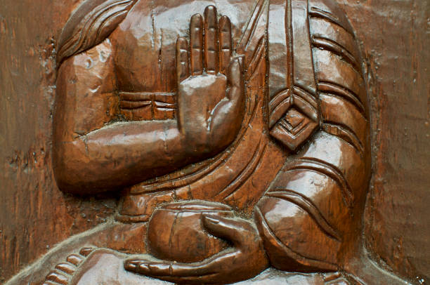 Close up of a Buddhist Buddha hand positions (called Mudras) beautifully carved in wood. Located at the Nepalese Peace Pagoda in Brisbane, South Bank parklands
