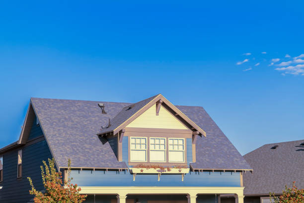 istock Large triple dormer window in an urban house 1199558934