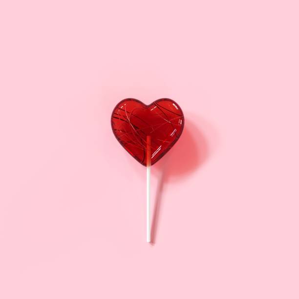 istock Crack Red Candy Heart on pink color background. Minimal valentine concept ideas. 3D Render 1199566828