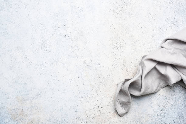 istock Grey linen kitchen napkin on concrete background 1199570848