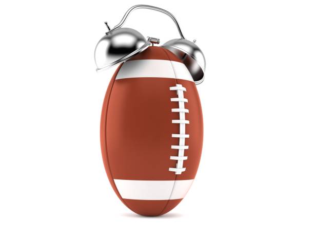istock Rugby ball with alarm clock 1199572549