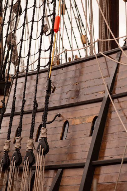 istock Wooden hull of ship with rigging 1199578325