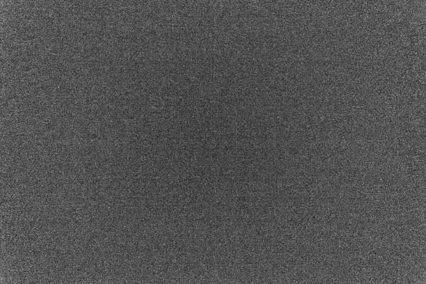 istock Black and white background with digital noise digital camera matrix. 1199580438