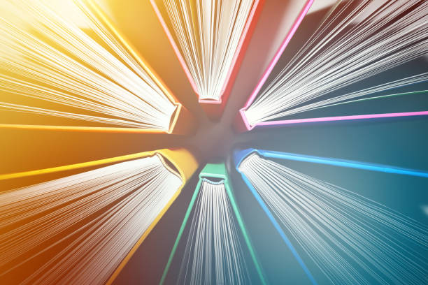 fanned out colorful books forming abstract circle pattern - explosion of knowledge - two dimensional shape paper exploding nobody imagens e fotografias de stock