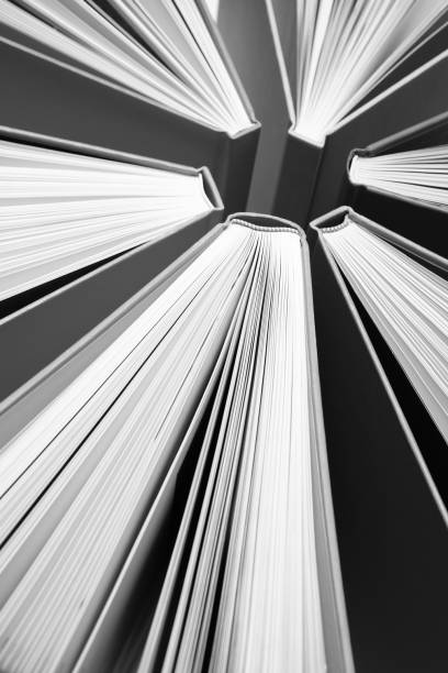 istock Fanned Out Books Forming Abstract Circle Pattern in Black and White 1199586326