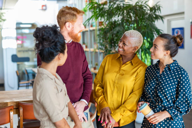 istock Diverse Business Group Meeting in a Cafe 1199587219