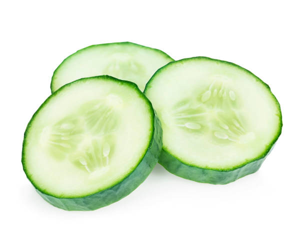 istock Fresh slice cucumber close-up on a white background. 1199587679