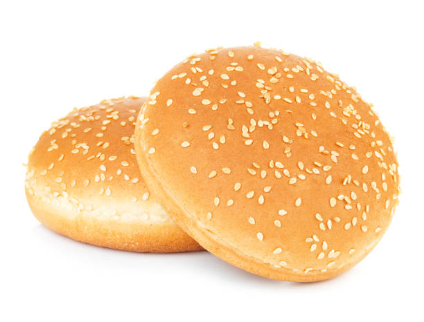 istock Two sandwich bun with sesame seeds isolated on white background. 1199587684