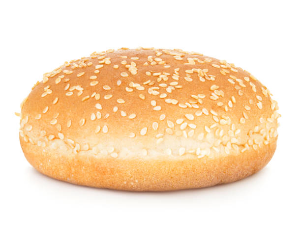 istock Burger bun with sesame seeds isolated on white background with clipping path. 1199587694