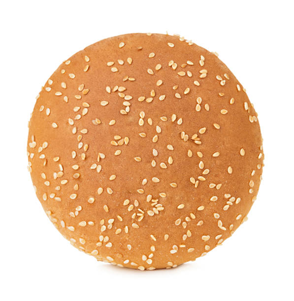 istock Burger bun with sesame seeds isolated on white background with clipping path. 1199589438