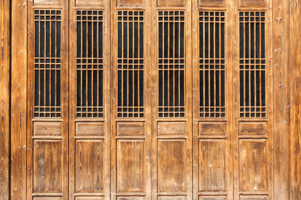 The Traditional Wooden Door With Lattice Windows Which Has The
