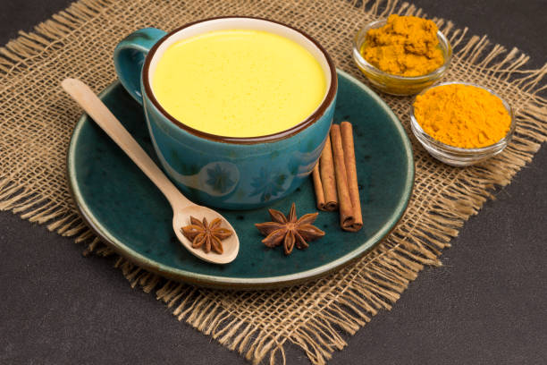 istock Herbal therapy concept.  Golden latte with ingredients for cooking 1199597675