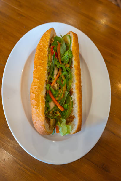 Vertical photo of Vietnam chicken sandwich- Banh Mi