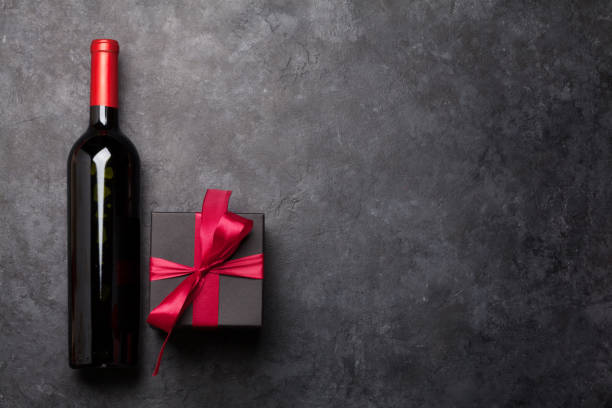 istock Valentines day card with wine and gift box 1199598707