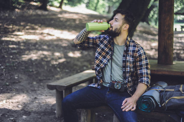 istock Young man resting in nature 1199599471