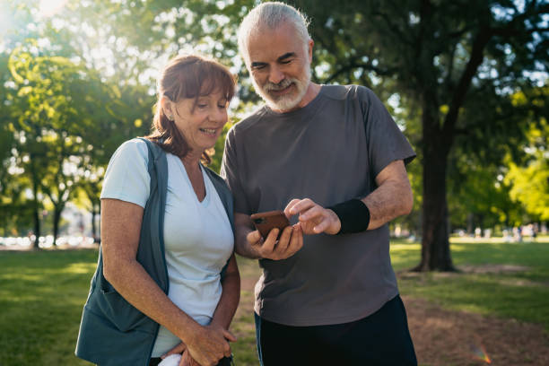 istock Senior couple checking tracking fitness statistics 1199599711