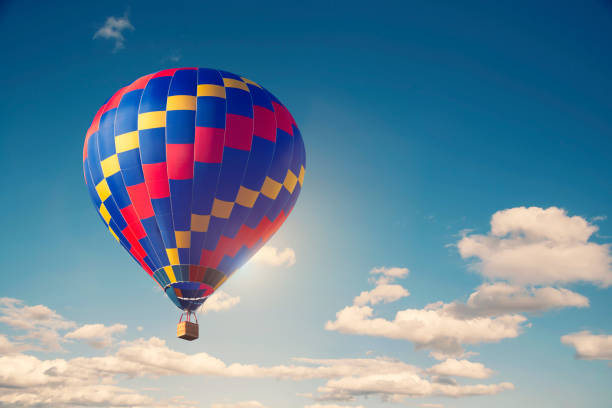 Hot air balloon flying in sky in Thailand