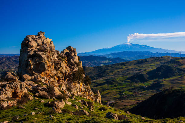 View of the Sicilian countryside. Etna volcano in the background