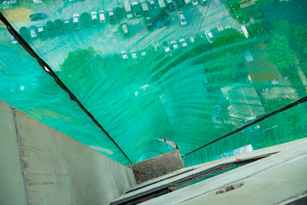 istock Dust proof mesh (Mesh Sheet) is suitable for covering the building under construction. To prevent dust and debris falling out of the building The dustproof net is porous so the wind can pass through. 1199602448