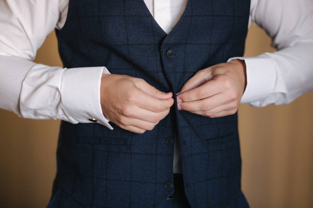 istock Handsome young groom dressed at hotel. Morning in hotel 1199606062