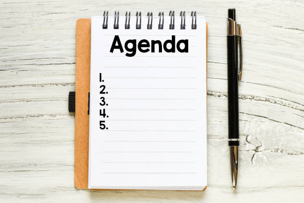 istock Agenda text on notepad - business concept 1199607507