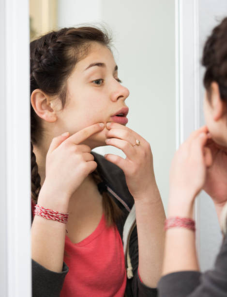 istock Girl cleaning pores 1199607516