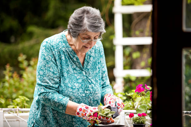 istock Female gardener 1199609168