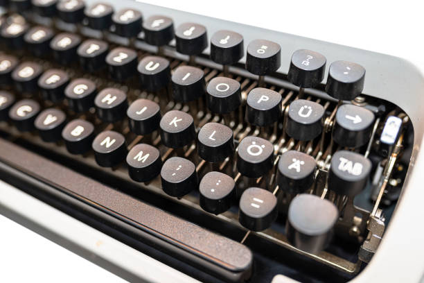istock Classic, manual typewriter in white with a German keyboard layout, isolated on a white background with a clipping path. 1199609505