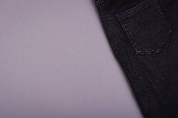 istock Black cotton jeans texture background with copy space. 1199610582