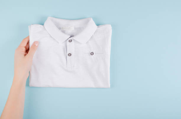 istock Textile, shirt composition on color background. Flat lay. 1199613056
