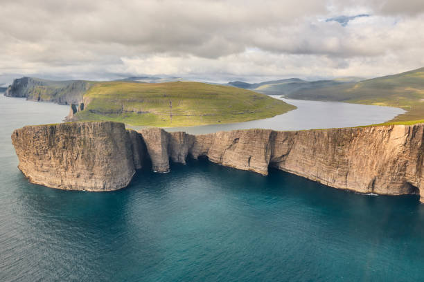 istock Faroe islands dramatic coastline in Vagar. Leitisvatn lake 1199615331