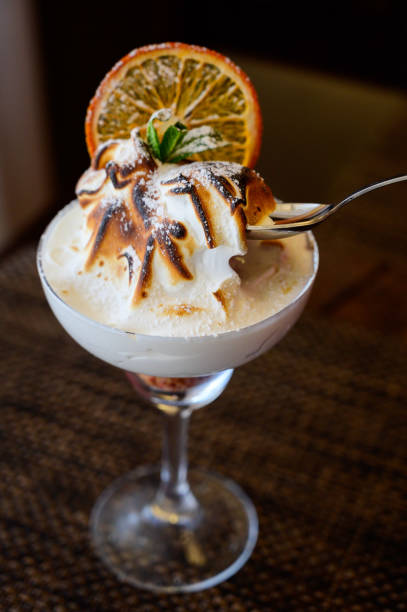 istock Ice cream with chocolate topping in a glass 1199616004