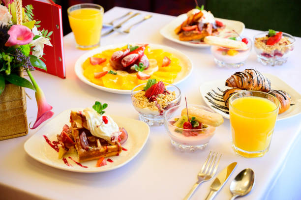 istock Dessert with croissants, ice cream and sliced fruit 1199616048