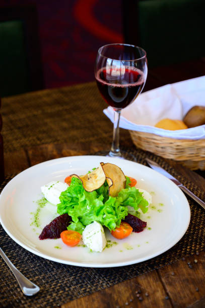 istock Salad with tomatoes, cheese, lettuce and beet 1199616115