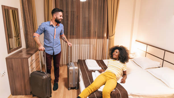 istock Young couple just arriving in hotel 1199617169